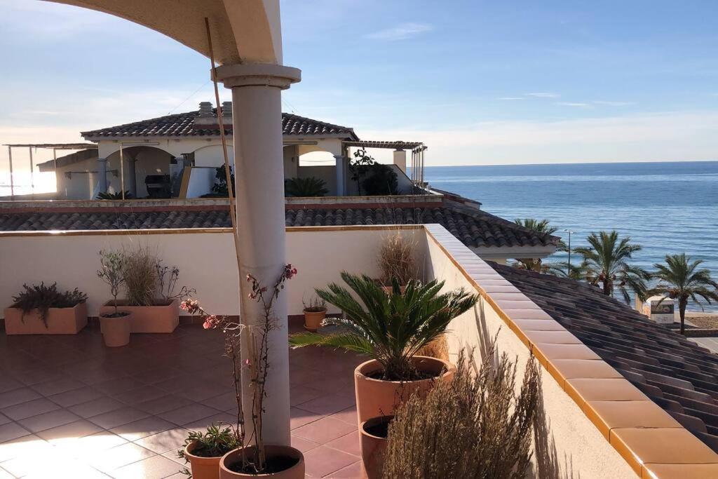 Cal Salmare Seafront Apartment With Rooftop Terrace And Pool Калафел Екстериор снимка